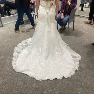 Selling my wedding dress! Only tried on, no alterations were made.